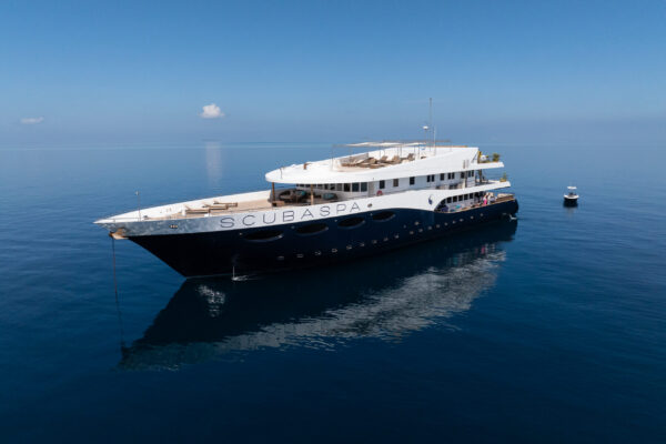 Luxury liveaboard vessel Scubaspa anchored in the Maldives during corporate conference retreat