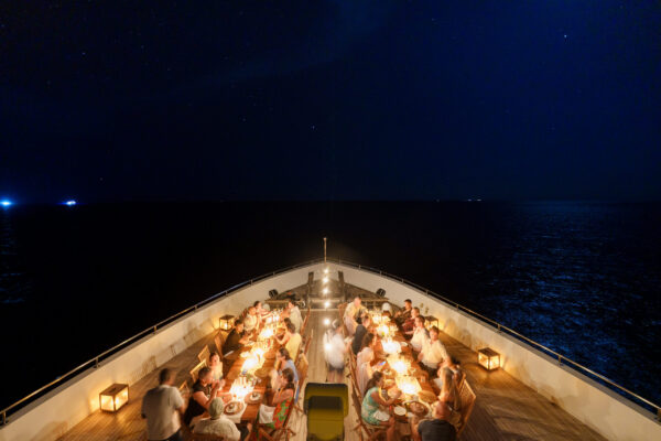 Closing night event celebration and group gathering on Scubaspa deck